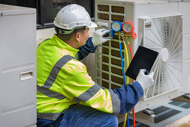 Professional Hvac technician working in Belmont, MA